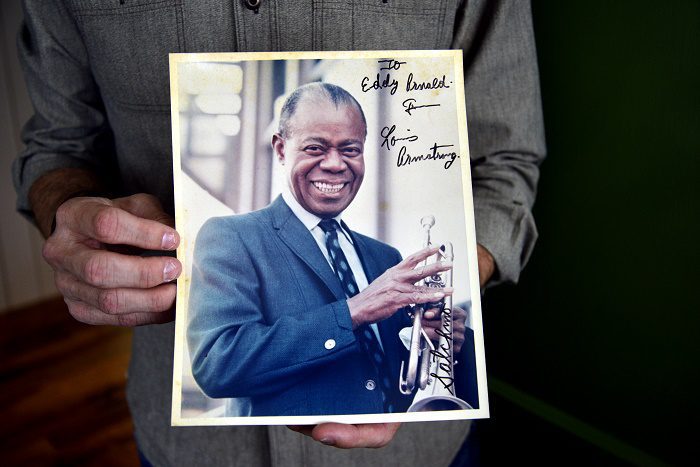 Shannon Pollard holds a signed photograph from Louis Armstrong at his studio in Nashville, Tennessee. Mr Pollard is the grandson of country music singer Eddy Aronald. Tues July 26, 2016 (Photo by Billy Weeks)