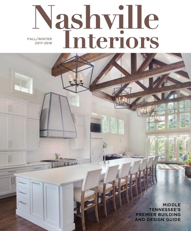 Luxury kitchen with white cabinets and vaulted wood beams in Nashville home © Nashville Interiors