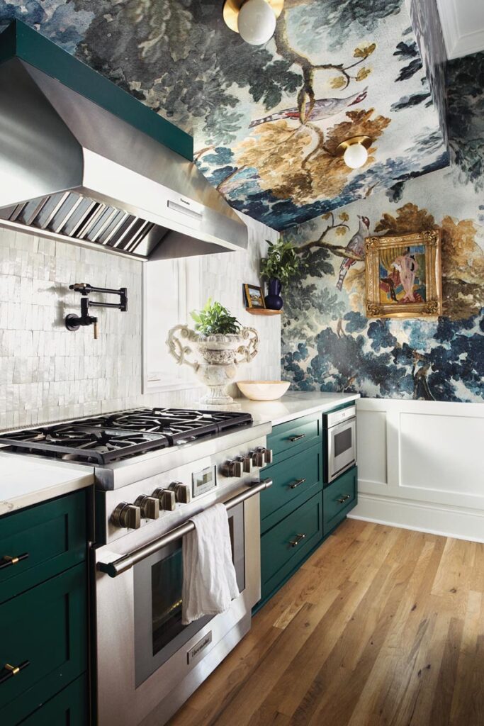 Luxurious kitchen with artistic ceiling and modern green cabinetry © Nashville Interiors
