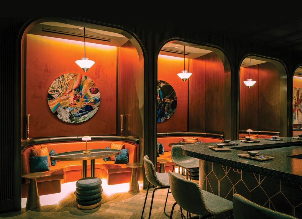 Luxurious modern bar with plush seating and atmospheric lighting © Nashville Interiors