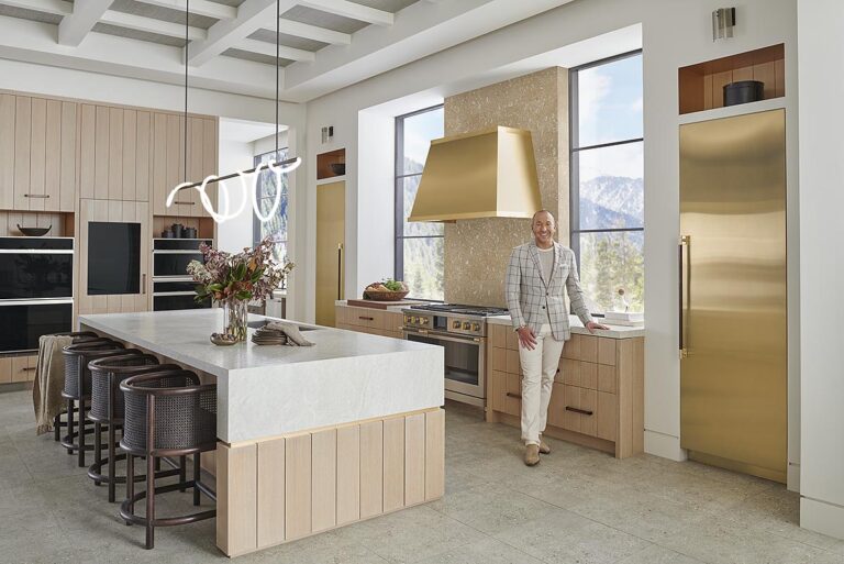Modern kitchen design with marble island and gold accents - Nashville Interiors